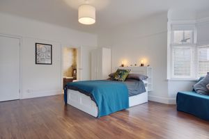 Bedroom One- click for photo gallery